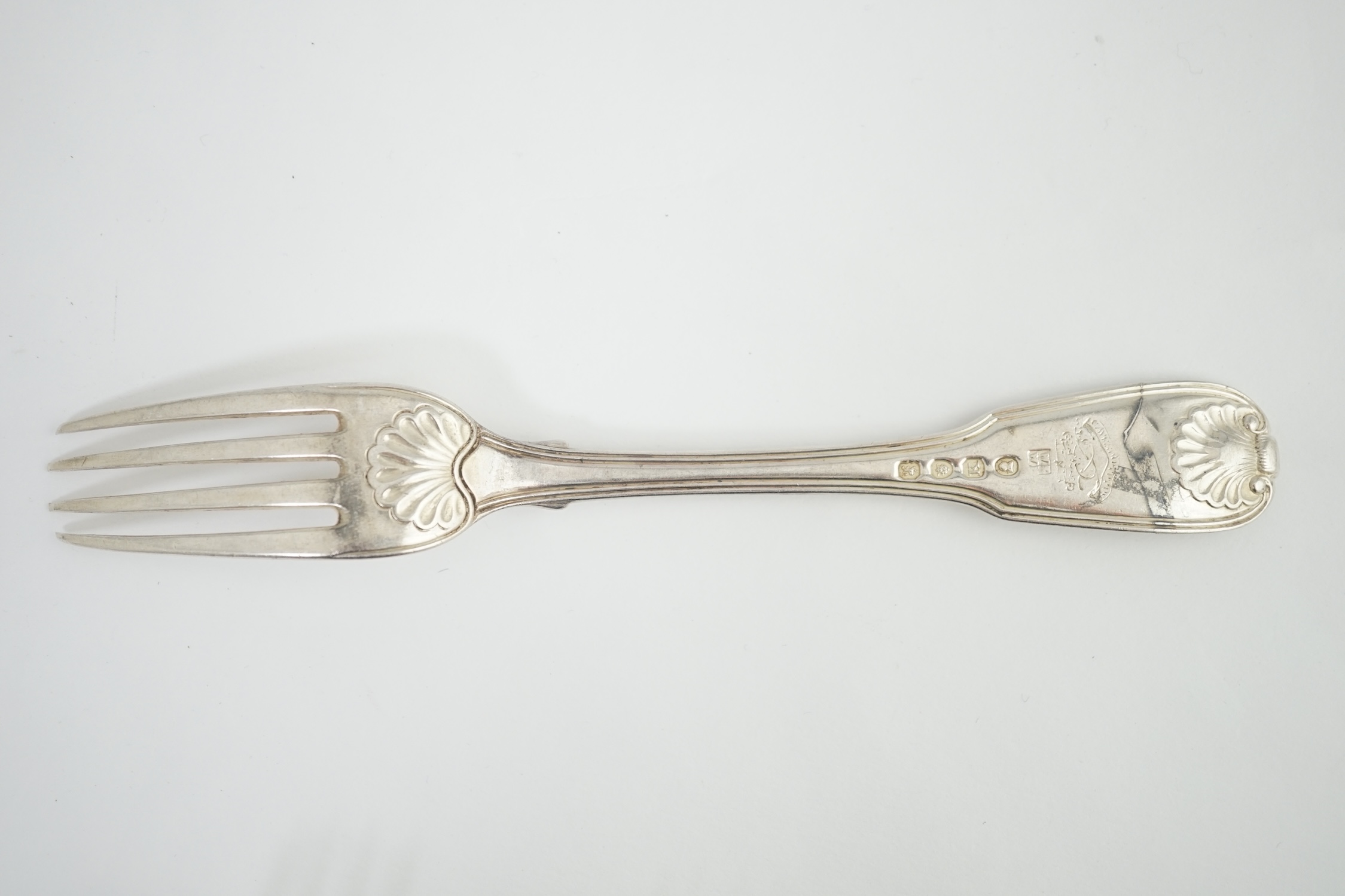 A set of six George III silver fiddle, thread and shell pattern table forks, by William Eley and William Fearn